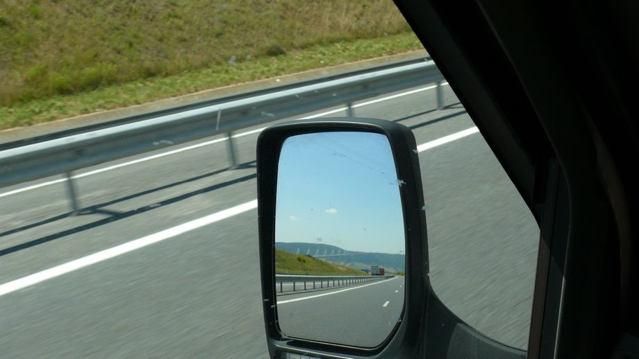 A distant view of the Millau Bridge in my rear view mirror