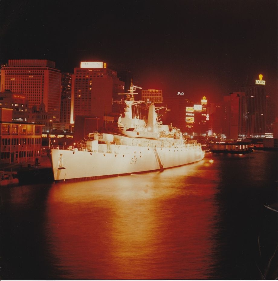HMS Glamorgan, our destroyer escort parked behind us in Hong Kong harbour, late 1968