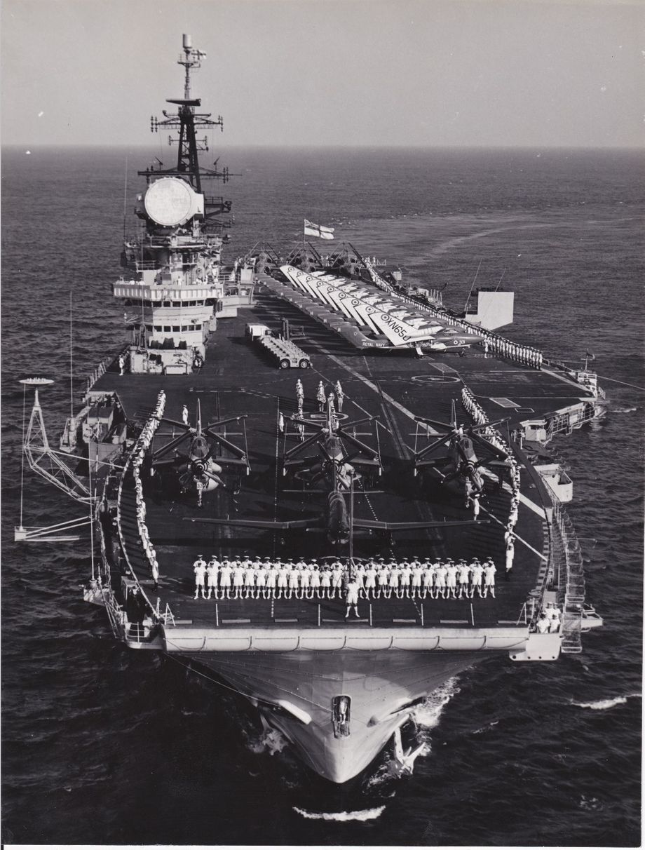 HMS Hermes enters Cape Town in 'Procedure Alpha' (Whilst off Penang, Malaysia I flew off the ship using the steam catapults in the aircraft parked right at the front)