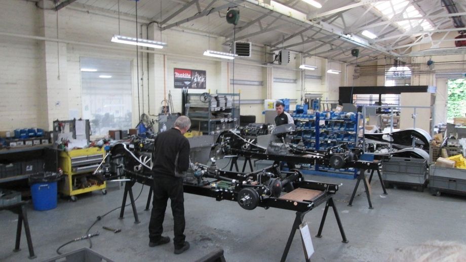 The chassis being married up with axles and engines for the 4/4 model